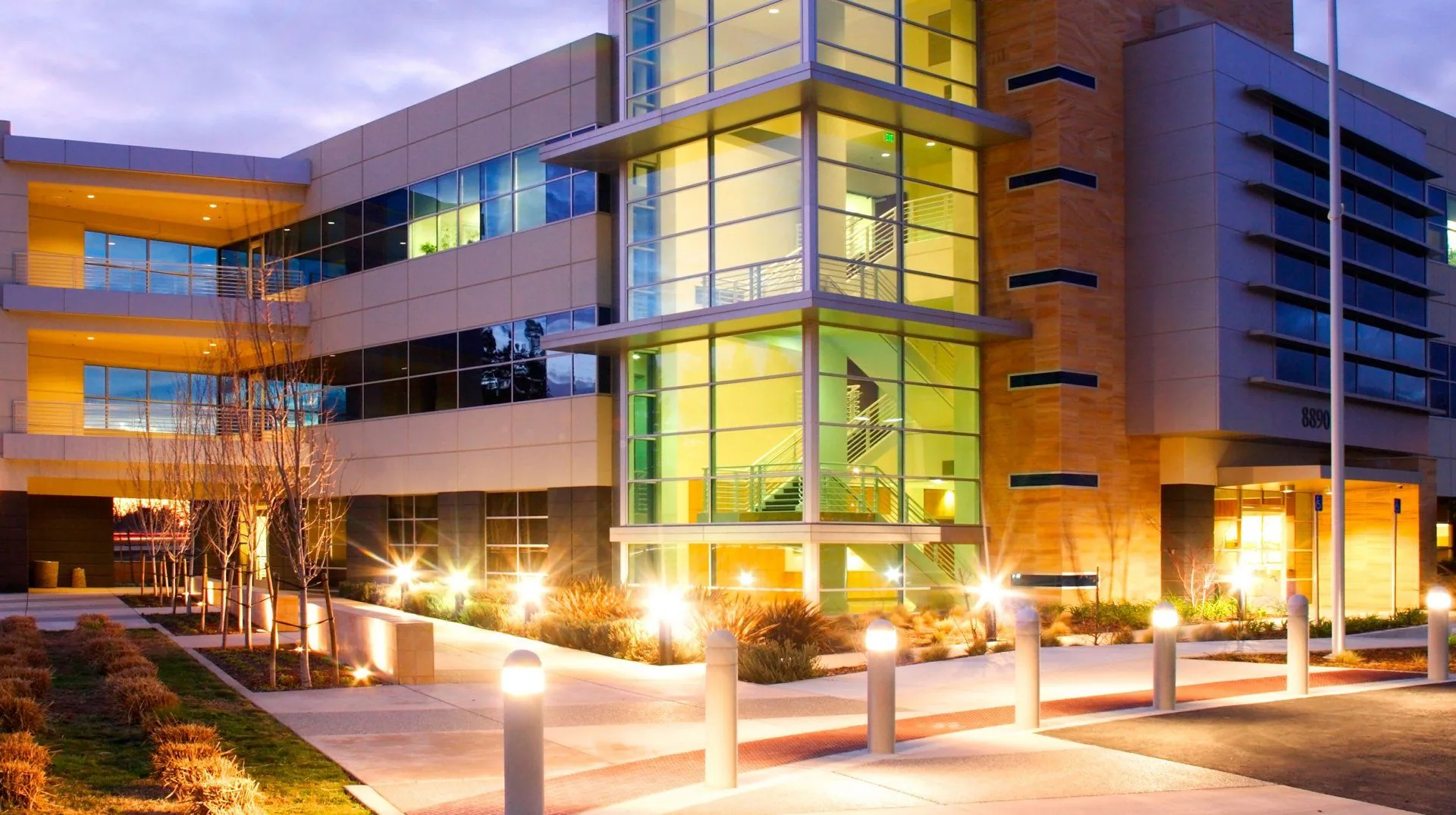 Commercial office building exterior bollard lighting dusk